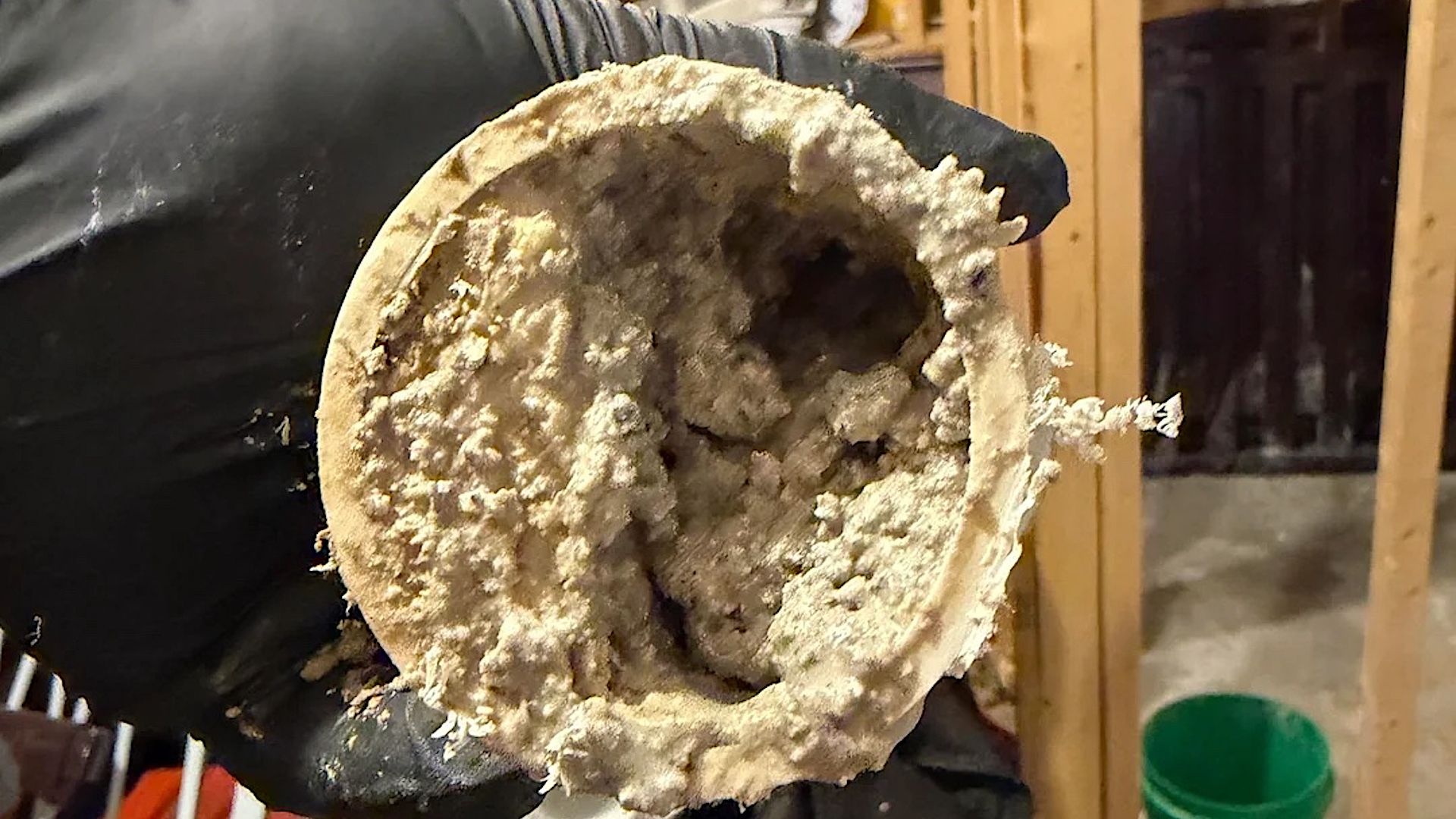 Before — grease and sediment narrowing bore